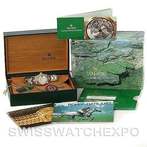 This image shows a Rolex Datejust 69163 Women's Stainless Steel Grey Dial 69163 Women's Stainless Steel Grey Dial watch in a box, surrounded by manuals, service booklet, and original packaging.