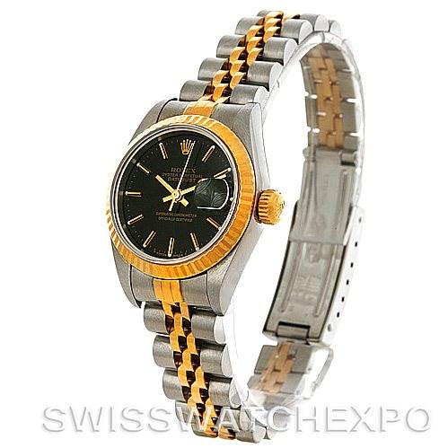 This image shows a Rolex Datejust 69173 Women's Stainless Steel Black Dial 69173 Women's Stainless Steel Black Dial model watch, featuring its black dial, gold fluted bezel, and two-tone Jubilee bracelet at an angled front view.