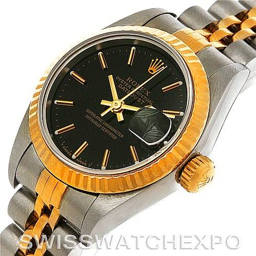 The image shows a Rolex Datejust 69173 Women's Stainless Steel Black Dial 69173 Women's Stainless Steel Black Dial watch at an angled close-up, displaying the face, bezel, crown, and part of the bracelet.