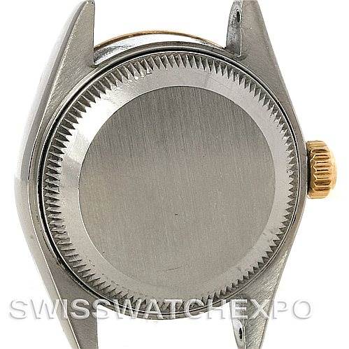 This image shows the back case and crown of a Rolex Datejust 69173 Women's Stainless Steel Black Dial 69173 Women's Stainless Steel Black Dial watch viewed from a straight-on angle.