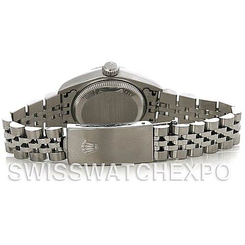 The image shows the back view of a Rolex Datejust 79174 Women's Stainless Steel White Dial 79174 Women's Stainless Steel White Dial watch, highlighting its bracelet and the clasp with the Rolex logo.