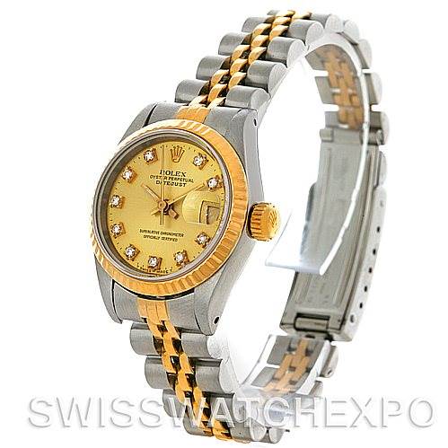 The image shows a Rolex Datejust 69173 Women's Stainless Steel Champagne Dial 69173 Women's Stainless Steel Champagne Dial watch from an angled side view highlighting the face, bezel, and two-tone bracelet.