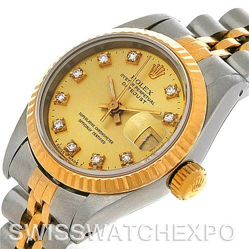 The image shows a close-up angled view of a Rolex Datejust 69173 Women's Stainless Steel Champagne Dial 69173 Women's Stainless Steel Champagne Dial watch, highlighting its dial, bezel, crown, and part of the bracelet.