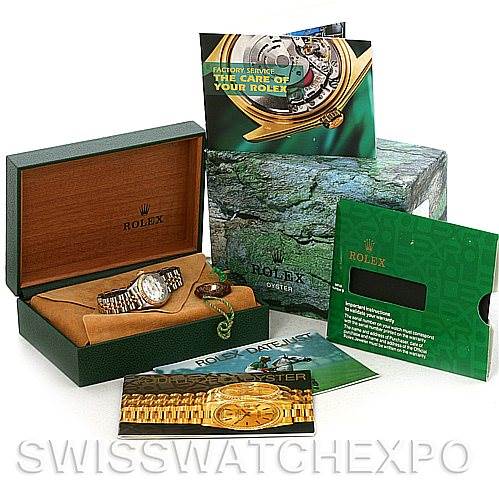 The image shows a Rolex Datejust 69173 Women's Stainless Steel White Dial 69173 Women's Stainless Steel White Dial watch from an angled view and includes the watch box, booklets, and accessories.