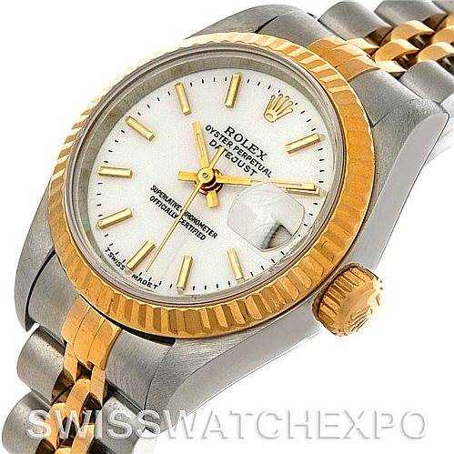 The image shows a close-up angled view of a Rolex Datejust 69173 Women's Stainless Steel White Dial 69173 Women's Stainless Steel White Dial watch, highlighting its gold and silver bracelet, bezel, crown, and face.