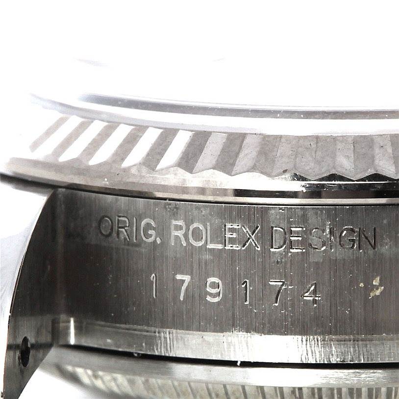 This close-up angled photo shows the model number "179174" on the case of a Rolex Datejust 179174 Women's Stainless Steel Pink Dial 179174 Women's Stainless Steel Pink Dial watch.