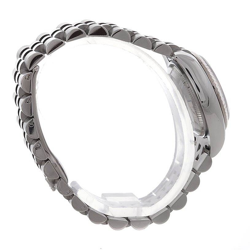 The image shows a side view of the Rolex Datejust 179174 Women's Stainless Steel Pink Dial 179174 Women's Stainless Steel Pink Dial wristwatch, highlighting its band and partially visible case.