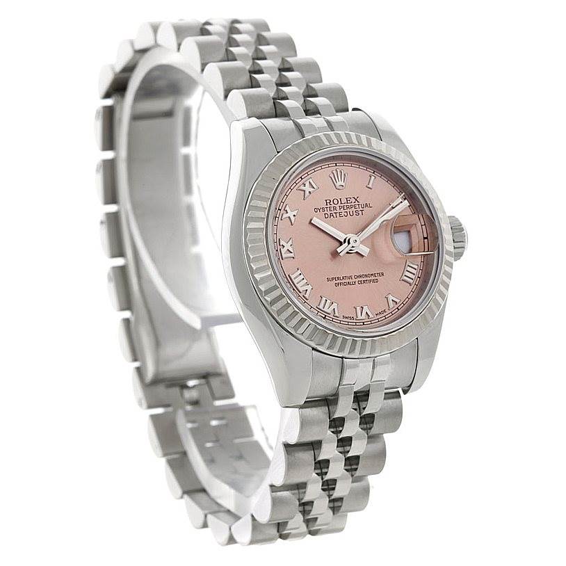 The image shows a side angle of the Rolex Datejust 179174 Women's Stainless Steel Pink Dial 179174 Women's Stainless Steel Pink Dial watch, displaying its pink dial, bezel, and jubilee bracelet.