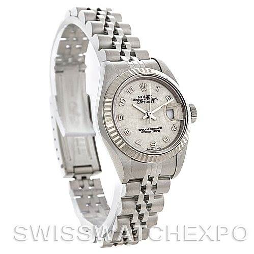 The image shows a Rolex Datejust 79174 Women's Stainless Steel Beige Dial 79174 Women's Stainless Steel Beige Dial watch angled to display its dial, case, bezel, crown, and bracelet prominently.