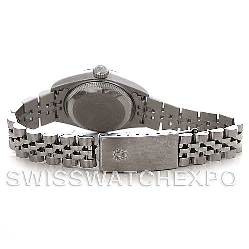 The image shows the back view of a Rolex Datejust 79174 Women's Stainless Steel Beige Dial 79174 Women's Stainless Steel Beige Dial watch, highlighting its Oyster case back, crown, and Jubilee bracelet with clasp.