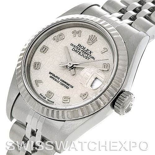 The image shows a Rolex Datejust 79174 Women's Stainless Steel Beige Dial 79174 Women's Stainless Steel Beige Dial watch from an angled top view, highlighting the face, bezel, winder, and part of the bracelet.