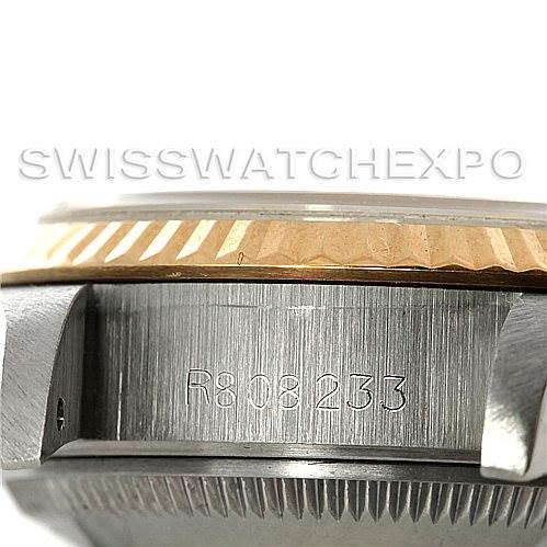 The image shows a side view of a Rolex Datejust 69173 Women's Stainless Steel Champagne Dial 69173 Women's Stainless Steel Champagne Dial watch case, featuring the serial number.