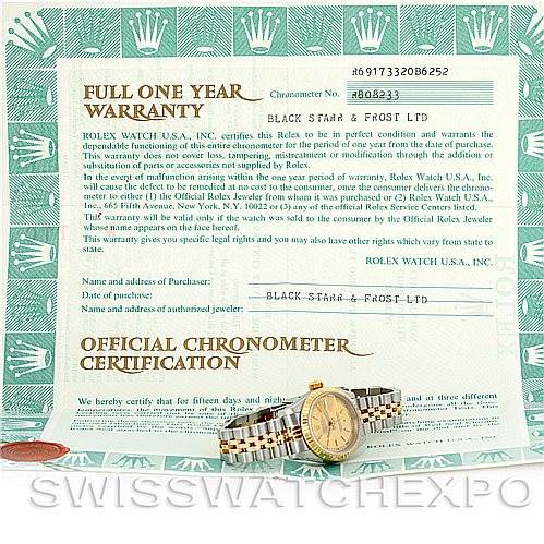 The image shows a Rolex Datejust 69173 Women's Stainless Steel Champagne Dial 69173 Women's Stainless Steel Champagne Dial watch lying flat with its warranty and chronometer certification documents displayed.