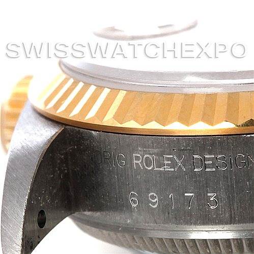 The image shows a close-up of the case side and bezel of a Rolex Datejust 69173 Women's Stainless Steel Champagne Dial 69173 Women's Stainless Steel Champagne Dial model, featuring the model number engraving.