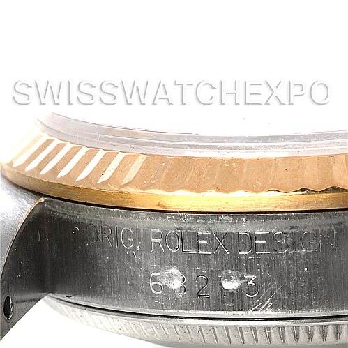 This image shows a close-up side angle of the case and bezel of a Mid-Size Rolex watch.