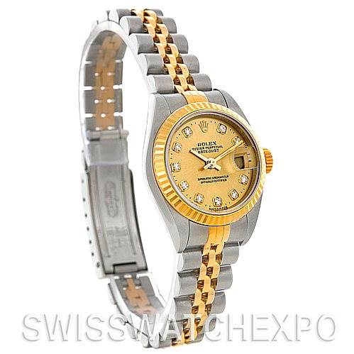 The image shows the Rolex Datejust 79173 Women's Stainless Steel Champagne Dial 79173 Women's Stainless Steel Champagne Dial watch at a three-quarter angle, highlighting its dial, bezel, bracelet, and clasp.