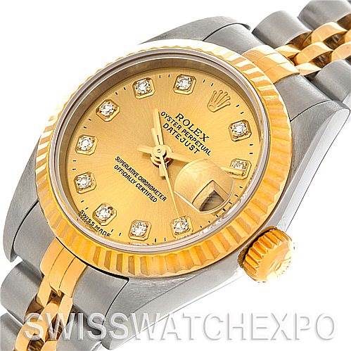 This image shows a close-up angle of a Rolex Datejust 79173 Women's Stainless Steel Champagne Dial 79173 Women's Stainless Steel Champagne Dial watch highlighting its dial, fluted bezel, crown, and part of the two-tone bracelet.