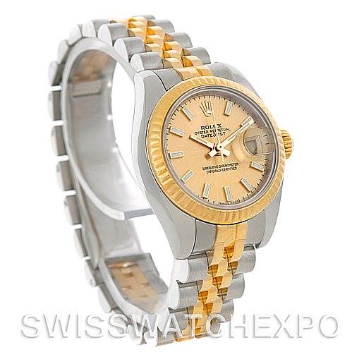 This image shows a Rolex Datejust 179173 Women's Steel and Gold (two tone) Champagne Dial 179173 Women's Steel and Gold (two tone) Champagne Dial watch at an angled side view, highlighting its gold and silver bracelet, face, and bezel.