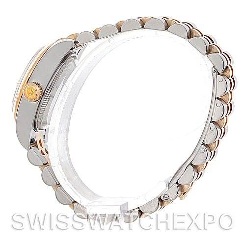 The image shows a side view of a Rolex Datejust 179173 Women's Steel and Gold (two tone) Champagne Dial 179173 Women's Steel and Gold (two tone) Champagne Dial watch, focusing on the crown and the two-tone bracelet.