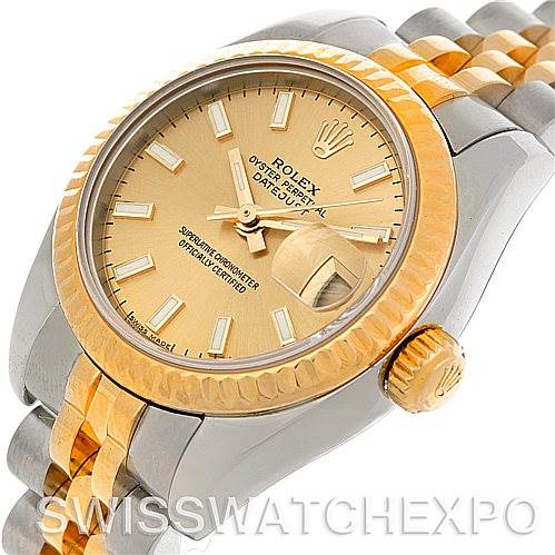The image shows a Rolex Datejust 179173 Women's Steel and Gold (two tone) Champagne Dial 179173 Women's Steel and Gold (two tone) Champagne Dial watch from a front angle, highlighting its gold bezel, dial, and two-tone Jubilee bracelet.