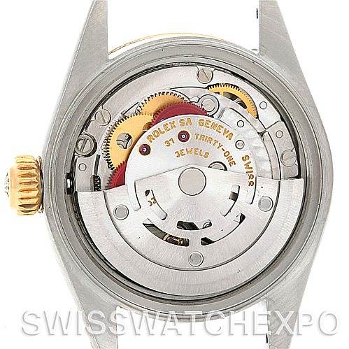 The image shows the back view of a Rolex Datejust 79173 Women's Stainless Steel Blue Dial 79173 Women's Stainless Steel Blue Dial watch, displaying its internal mechanical movement.