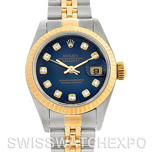 This image shows a Rolex Datejust 79173 Women's Stainless Steel Blue Dial 79173 Women's Stainless Steel Blue Dial watch from a top-down angle, featuring a blue dial, gold bezel, and two-tone bracelet.