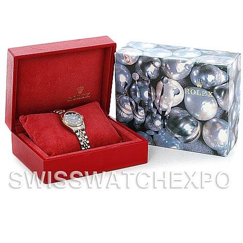 The image shows a Rolex Datejust 79173 Women's Stainless Steel Blue Dial 79173 Women's Stainless Steel Blue Dial model in its open case and its packaging box next to it.