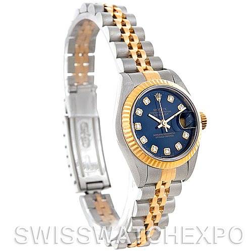 The image shows a Rolex Datejust 79173 Women's Stainless Steel Blue Dial 79173 Women's Stainless Steel Blue Dial watch at a side angle, displaying the bracelet, blue dial, fluted bezel, and part of the clasp.