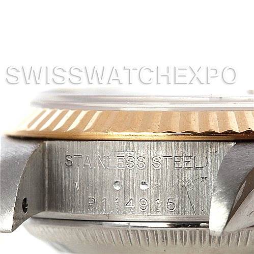 This image shows a close-up side view of the watch case for a Rolex Datejust 79173 Women's Stainless Steel Blue Dial 79173 Women's Stainless Steel Blue Dial, highlighting the stainless steel and model number.