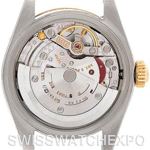 This image shows a close-up view of the Rolex Datejust 79163 Women's Steel and Gold (two tone) Black Dial 79163 Women's Steel and Gold (two tone) Black Dial model's movement mechanism from the back.