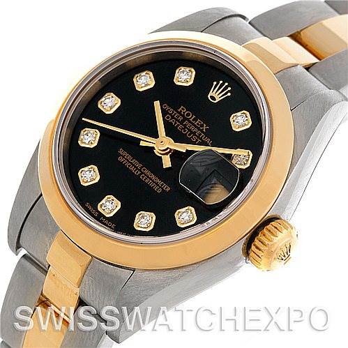 The image shows a Rolex Datejust 79163 Women's Steel and Gold (two tone) Black Dial 79163 Women's Steel and Gold (two tone) Black Dial watch at an angled top-down view, highlighting the black dial, diamond hour markers, and two-tone bracelet.