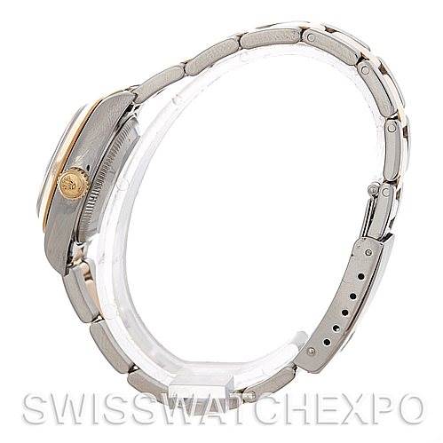 This image shows the Rolex Datejust 79163 Women's Steel and Gold (two tone) Black Dial 79163 Women's Steel and Gold (two tone) Black Dial watch from a side angle, highlighting the bracelet, case, and crown.