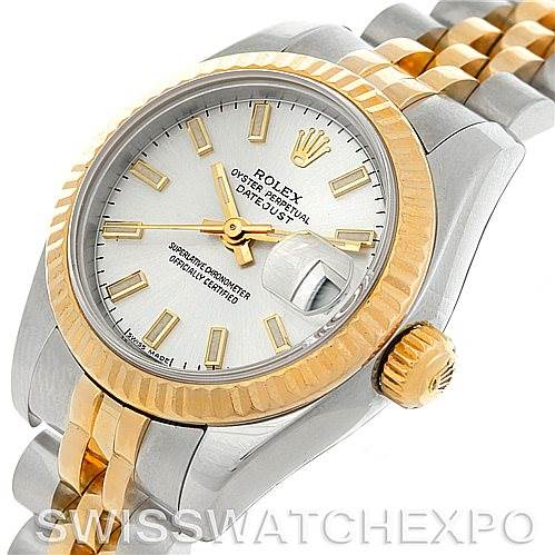 The image shows a close-up of a Rolex Datejust 179173SSJ Women's Steel and Gold (two tone) Champagne Dial 179173SSJ Women's Steel and Gold (two tone) Champagne Dial watch at an angle, highlighting the face, bezel, crown, and part of the bracelet.