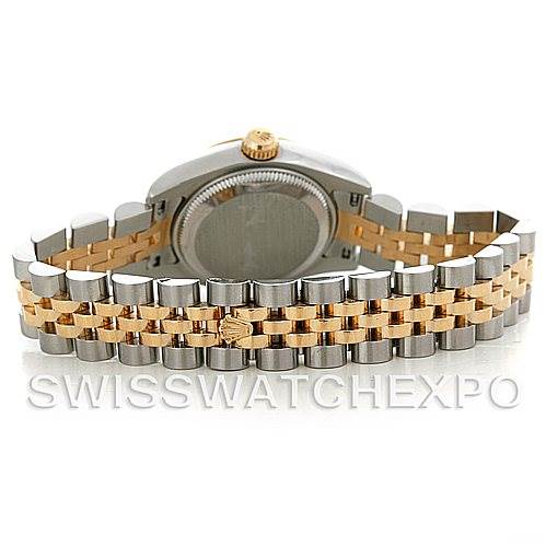 The image shows the back view of a Rolex Datejust 179173SSJ Women's Steel and Gold (two tone) Champagne Dial 179173SSJ Women's Steel and Gold (two tone) Champagne Dial watch, highlighting its two-tone Jubilee bracelet and case back.