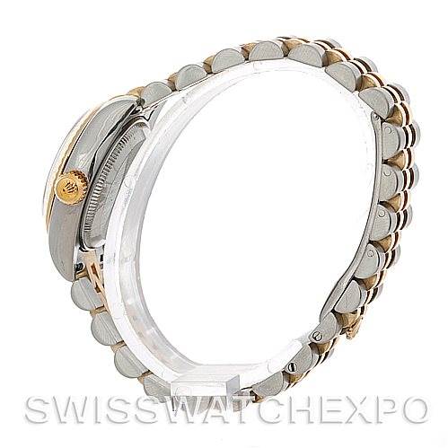 This image shows a side view of a Rolex Datejust 179173SSJ Women's Steel and Gold (two tone) Champagne Dial 179173SSJ Women's Steel and Gold (two tone) Champagne Dial watch, focusing on the crown, case, and part of the bracelet.