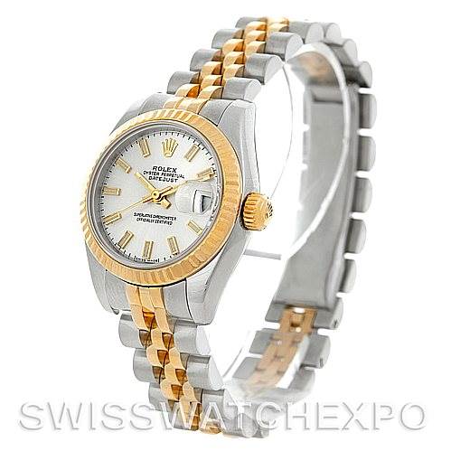 The image shows a Rolex Datejust 179173SSJ Women's Steel and Gold (two tone) Champagne Dial 179173SSJ Women's Steel and Gold (two tone) Champagne Dial watch at a slight angle, displaying its face, bezel, and two-tone bracelet.