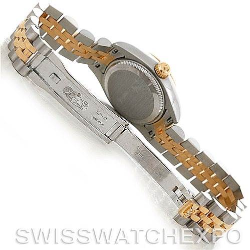 The image shows the back of the Rolex Datejust 179173SSJ Women's Steel and Gold (two tone) Champagne Dial 179173SSJ Women's Steel and Gold (two tone) Champagne Dial watch, focusing on the clasp and bracelet.
