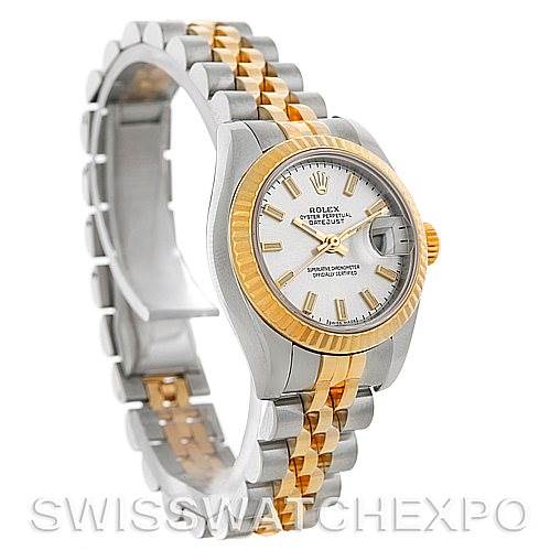This image shows a Rolex Datejust 179173SSJ Women's Steel and Gold (two tone) Champagne Dial 179173SSJ Women's Steel and Gold (two tone) Champagne Dial watch from a 3/4 angle, highlighting its silver and gold jubilee bracelet and fluted bezel.