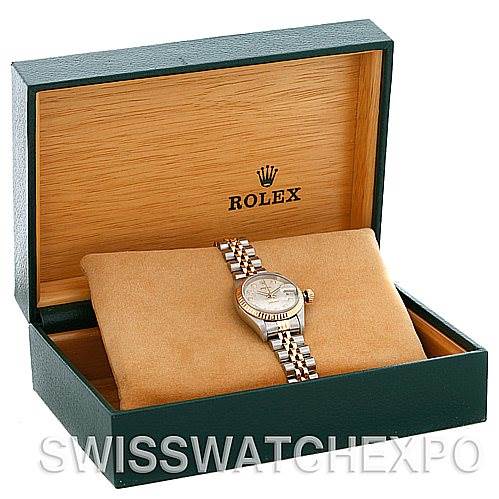 The image shows a Rolex Datejust 79173 Women's Stainless Steel Silver Dial 79173 Women's Stainless Steel Silver Dial watch in its green box, displaying the dial and Jubilee bracelet.