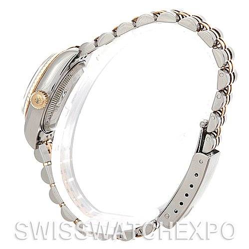 This side profile view of the Rolex Datejust 79173 Women's Stainless Steel Silver Dial 79173 Women's Stainless Steel Silver Dial watch shows the bracelet, clasp, and crown.