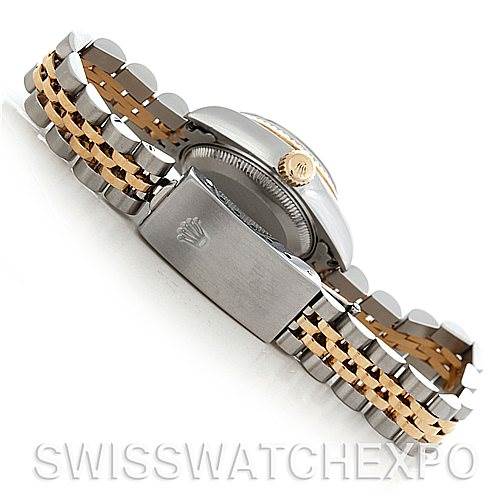 This image shows a side view of a Rolex Datejust 79173 Women's Stainless Steel Silver Dial 79173 Women's Stainless Steel Silver Dial watch, highlighting the crown, bracelet, and clasp with the Rolex emblem.