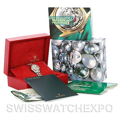 The image shows a Rolex Datejust 79173 Women's Stainless Steel Silver Dial 79173 Women's Stainless Steel Silver Dial watch in its box, along with booklets, tags, and packaging material.