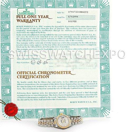 This image shows a Rolex Datejust 79173 Women's Stainless Steel Silver Dial 79173 Women's Stainless Steel Silver Dial watch positioned below its warranty and official chronometer certification documents.