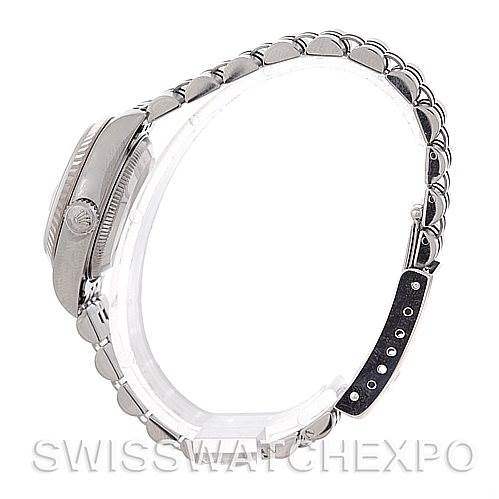 The image shows a Rolex Datejust 79174 Women's Stainless Steel White Dial 79174 Women's Stainless Steel White Dial watch from a side profile, highlighting the case, crown, and bracelet.