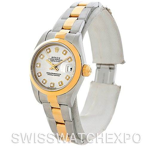 The image shows a Rolex Datejust 79163 Women's Steel and Gold (two tone) Silver Dial 79163 Women's Steel and Gold (two tone) Silver Dial watch featuring a two-tone metal bracelet, diamond hour markers, and a date window.