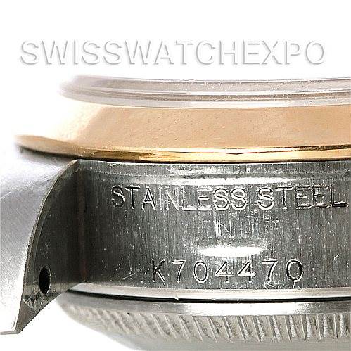 This image shows a close-up side view of the stainless steel case and serial number of a Rolex Datejust 79163 Women's Steel and Gold (two tone) Silver Dial 79163 Women's Steel and Gold (two tone) Silver Dial watch.