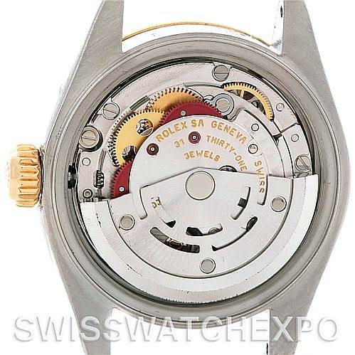 This image shows the internal movement mechanism of a Rolex Datejust 79173 Women's Stainless Steel Blue Dial 79173 Women's Stainless Steel Blue Dial watch, focusing on the rotor and gears.