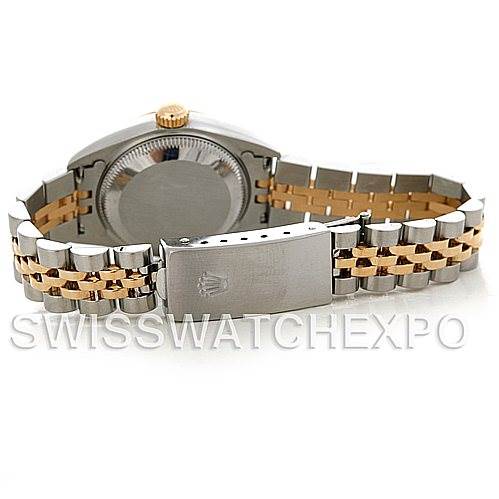 This image shows the back view of a Rolex Datejust 79173 Women's Stainless Steel Blue Dial 79173 Women's Stainless Steel Blue Dial watch, highlighting its case back, crown, and dual-tone bracelet with clasp.