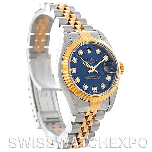 The image shows a Rolex Datejust 79173 Women's Stainless Steel Blue Dial 79173 Women's Stainless Steel Blue Dial watch with a blue dial, diamond hour markers, and a two-tone metal bracelet viewed from a front-left angle.