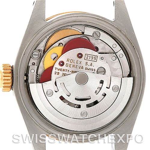 This image shows the back view of a Rolex Datejust 69173 Women's Stainless Steel Blue Dial 69173 Women's Stainless Steel Blue Dial model, showcasing its internal movement and mechanism.